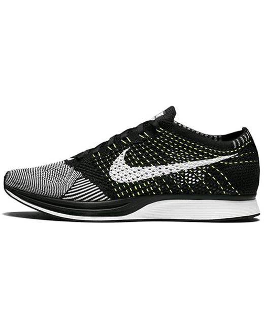 Nike Кроссовки унисекс Flyknit Racer Black White Volt черные 39 EU
