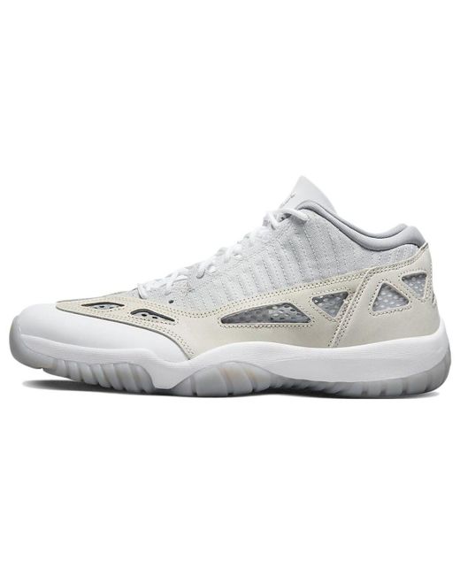 Jordan Кроссовки унисекс Air 11 Retro Low IE Light Orewood Brown 36 EU