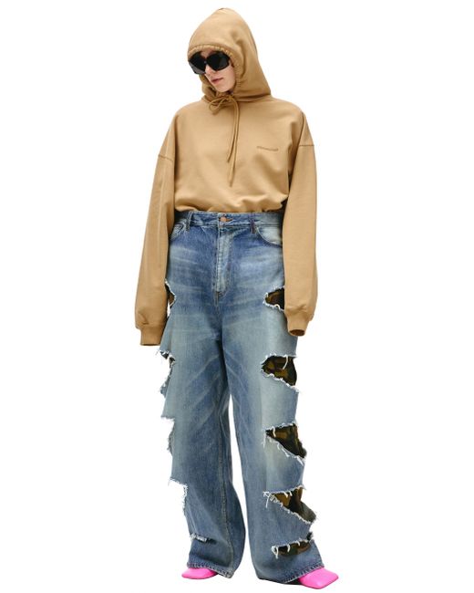 Balenciaga Рваные джинсы с камуфляжной подкладкой