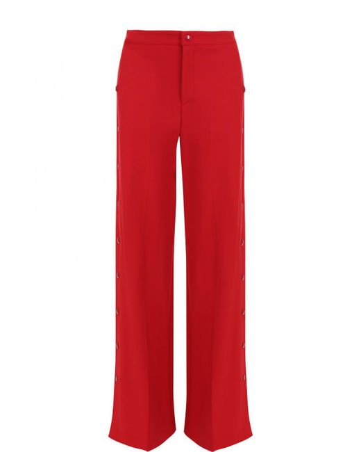 Red Valentino Однотонные расклешенные брюки с заклепками