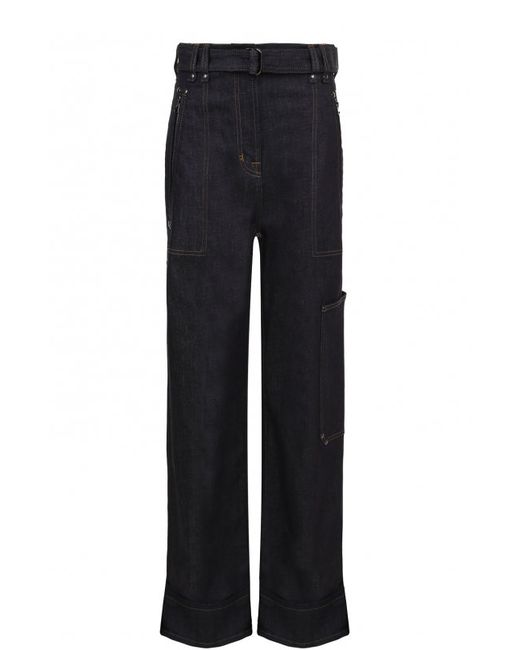 Tom Ford Расклешенные джинсы с контрастной прострочкой и поясом